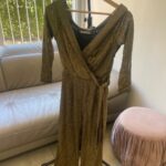 אוברול זהב שחור Favola Boutique - פאבולה בוטיק יד שנייה בנמיז - Nemyz