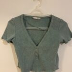 חולצת קרופ טורקיז Pull & Bear - פול אנד בר יד שנייה בנמיז - Nemyz